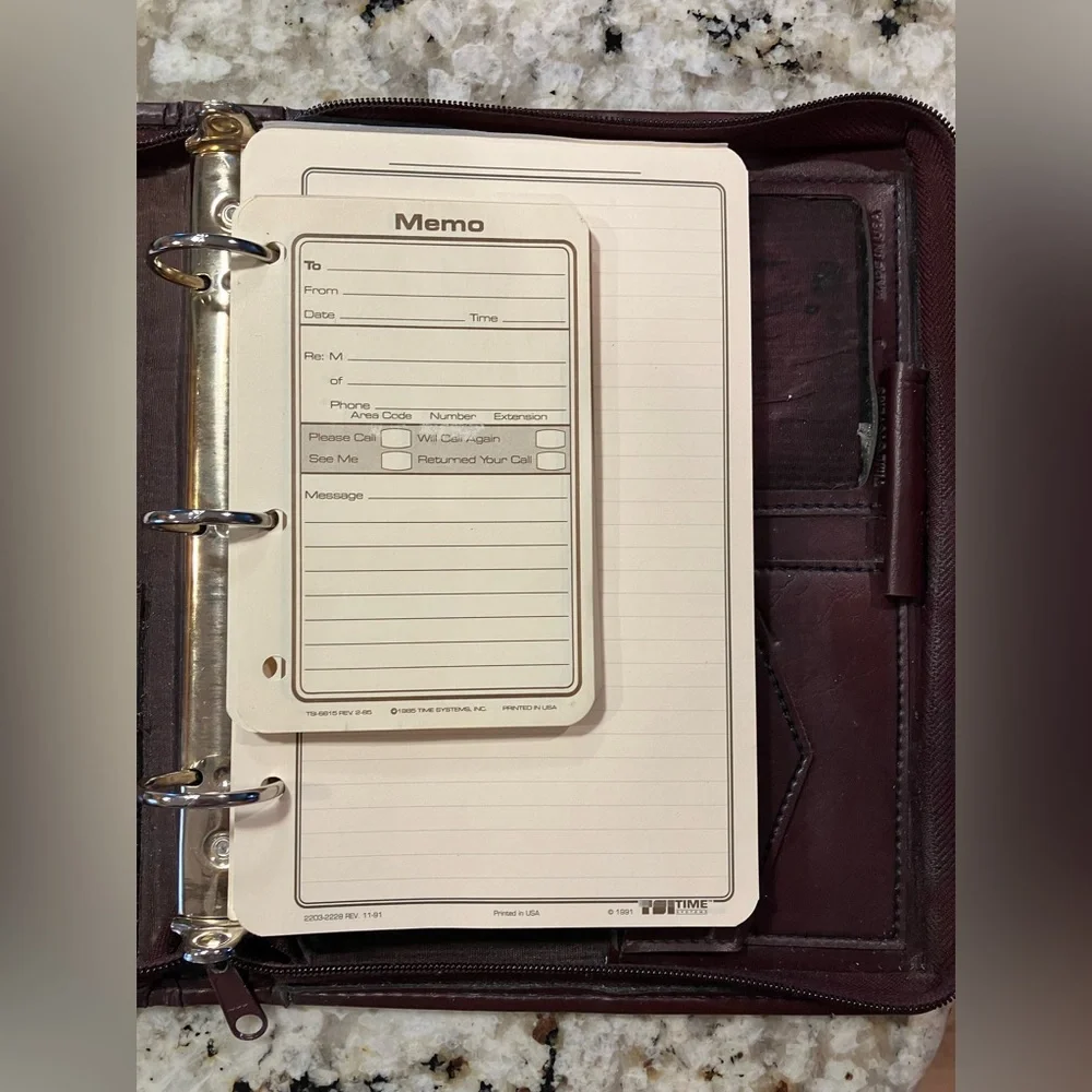 3-Ring Day-Timer planner binder with zipper closure